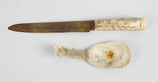 A 19th century Inuit carved reindeer bone spoon, with carved handle and engraved bowl, together with