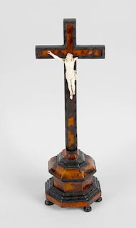 A 19th century Corpus Christi crucifix, with shaped base with applied tortoiseshell veneers, with se