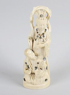 A good Japanese Meiji period inlaid ivory okimono, modelled as a courtly lady, with mother of pearl