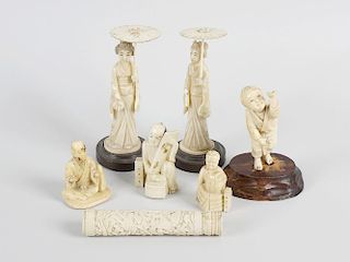 Three carved ivory netsukes, a small ivory figure modelled as a young boy (incomplete), 3.5 (9cm) hi