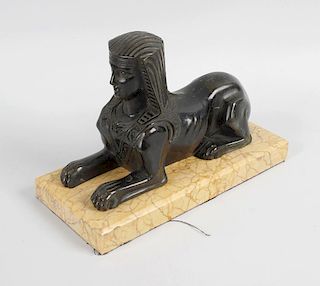 A late 19th century bronze study of a Sphinx, upon a plinth style marble base, 8 (20.25cm) long.