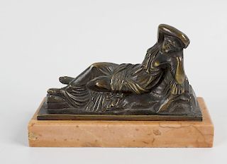 A 19th century bronze figure, modelled as a semi-nude reclining female raised upon a marble base, 5.