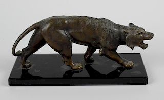 A small early 20th century Japanese bronze model of a crouching tiger or panther in stalking pose, o