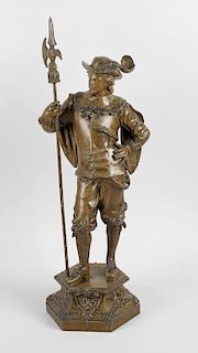 A large early 20th century spelter figure, modelled as a musketeer, standing and holding a pike, upo