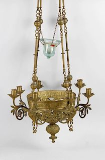 A gothic revival gilt metal eight-branch ceiling candelabrumFormed as a pierced hemispherical body w