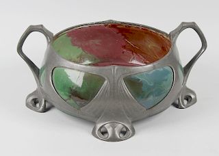 An Art Nouveau pewter and pottery bowlOsiris, of squat cauldron form with twin handles over cagework