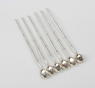 A set of six silver sherbet spoons, each having shallow oval bowl marked silver to the banded stem o