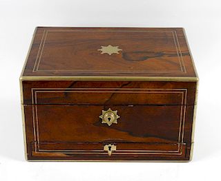 A 19th century rosewood jewellery or storage box, having brass mounts, inlay and vacant cartouche to