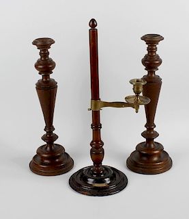 Shipbreakers timber. A turned candlestick with adjustable brass candle holder on brass arm, H. M. S.
