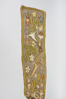An unusual crewel work border. Perhaps for a window or for a table cover, in three sections, two L-s