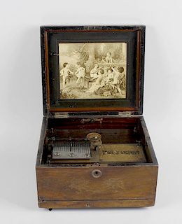 A late 19th century stained wooden cased table top Polyphon (a/f), a late 19th century cylinder musi