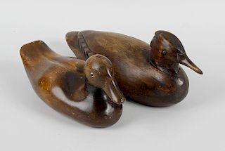 A group of carved wooden duck decoys and models, largest 12 (30.5cm) long.