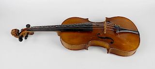 A cased violinThe two-piece back of good figure, with well-carved scroll over ebonised tuning pegs,