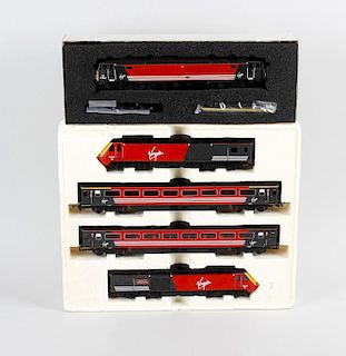 A box containing a Heljan 00 Gauge model railway class 47 diesel locomotive in original box, a Hornb