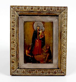 A late 19th century icon, the hand painted oil on panel depicting the Virgin Mary and Christ, with a