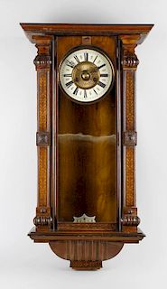 An early 20th century Vienna wall clock. The seven-inch cream chapter ring having Roman numerals wit