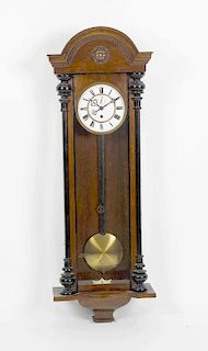 A fruitwood-cased weight-driven Vienna wall clockThe 6.5-inch white Roman dial with subsidiary secon