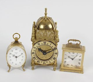 A box containing a mixed selection of assorted clocks and timepieces, to include a Smiths brass case