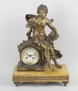 A French spelter and marble mantel clock, F. Moreau, Japy Freres Paris. The 3.5 white enamel Arabic