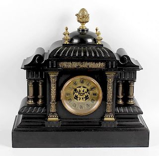 A large late 19th century French black slate mantel clockThe 4.75-inch dial having a cellular Roman
