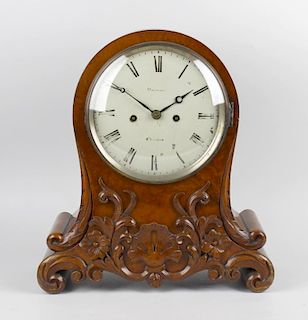 A Victorian carved walnut twin fusee bracket clockThe 7.5-inch cream-painted convex Roman dial inscr