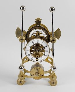 A good quality replica Harrison-type skeleton 'sea' clock.With 4-inch white Roman chapter ring frami