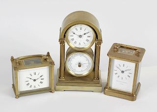 A late 19th century combined desk clock and barometer, the arched brass case with column detail (mec