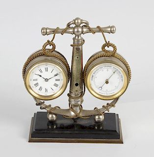 A late 19th century combined desk clock and barometer, modelled as a rope entwined anchor supporting