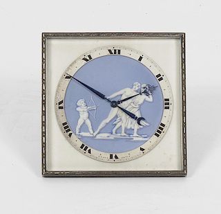 A Swiss Art Deco boudoir clockThe 3.25-inch silvered Roman chapter ring, marked 8 DAYS SWISS, framin