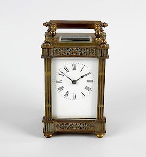 A brass cased carriage clock, circa 1900, having a white Roman dial, the single train timepiece move