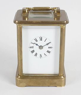 A 20th century brass corniche-cased carriage clock. Charles Frodsham, LondonThe 3-inch white dial wi