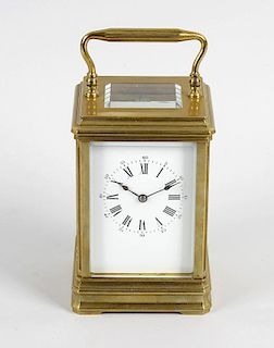 A French brass-cased carriage clockRichard & Cie. The 2.75-inch white dial with Roman hours and Arab