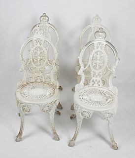 Garden furniture: Two white-painted wirework plantersCirca 1900, each of typical through form on int