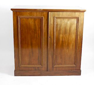 A late 19th century mahogany linen press cupboard, the plain rectangular top above a front fitted wi