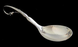 Georg Jensen silver spoon, the loop handle with leaf and berry finial. Import mark for 1929