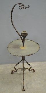 A  wrought iron and copper kettle stand, the hammered copper tray with leaf design in star formation