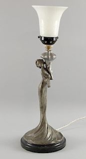 An Art Nouveau style figural white metal table lamp with white glass shade, total height 48cm