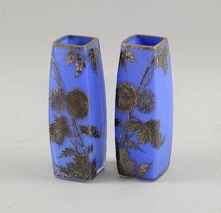 A pair of glass vases with silver overlay, clear cased blue glass with  Art Nouveau design of flower