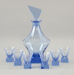 An Art Deco blue glass liquor set comprising decanter and stopper 28 cm  and six glasses on square b