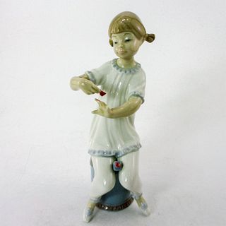 Girl Manicuring 1001082 - Lladro Porcelain Figurine