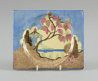 Clarice Cliff Plate, painted with a tree with brown and pink flowers, with early 1930s backstamp The