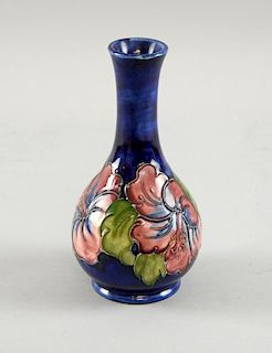 Moorcroft vase of baluster form, with hibiscus flower decoration, green painted mark to base togethe