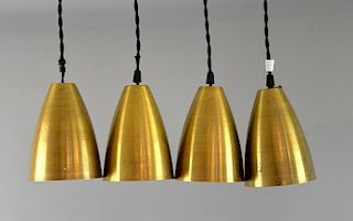 Four brass conical ceiling lights