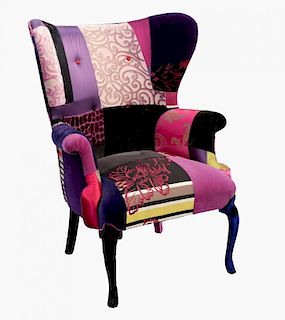 Squint patchwork wing-back armchair on cabriole legsNote: VAT payable on the hammer price collection