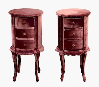 Pair of Squint bedside chests in pink, of three drawers, on cabriole legs, 75cm high 37cm diameterNo