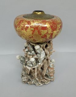 Oriental Porcelain Incense Burner with Figural base.