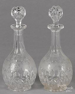 Pair of cut and etched glass decanters, 11'' h.