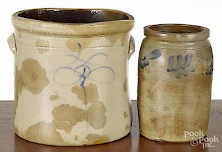 Two stoneware crocks, 19th c. to include one with cobalt scrolled decoration, 11 1/2'' h.