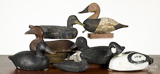 Duck decoys, 20th c., together with a pack basket.
