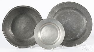 English pewter charger, 19th c., 15'' dia., together with a basin and a plate.